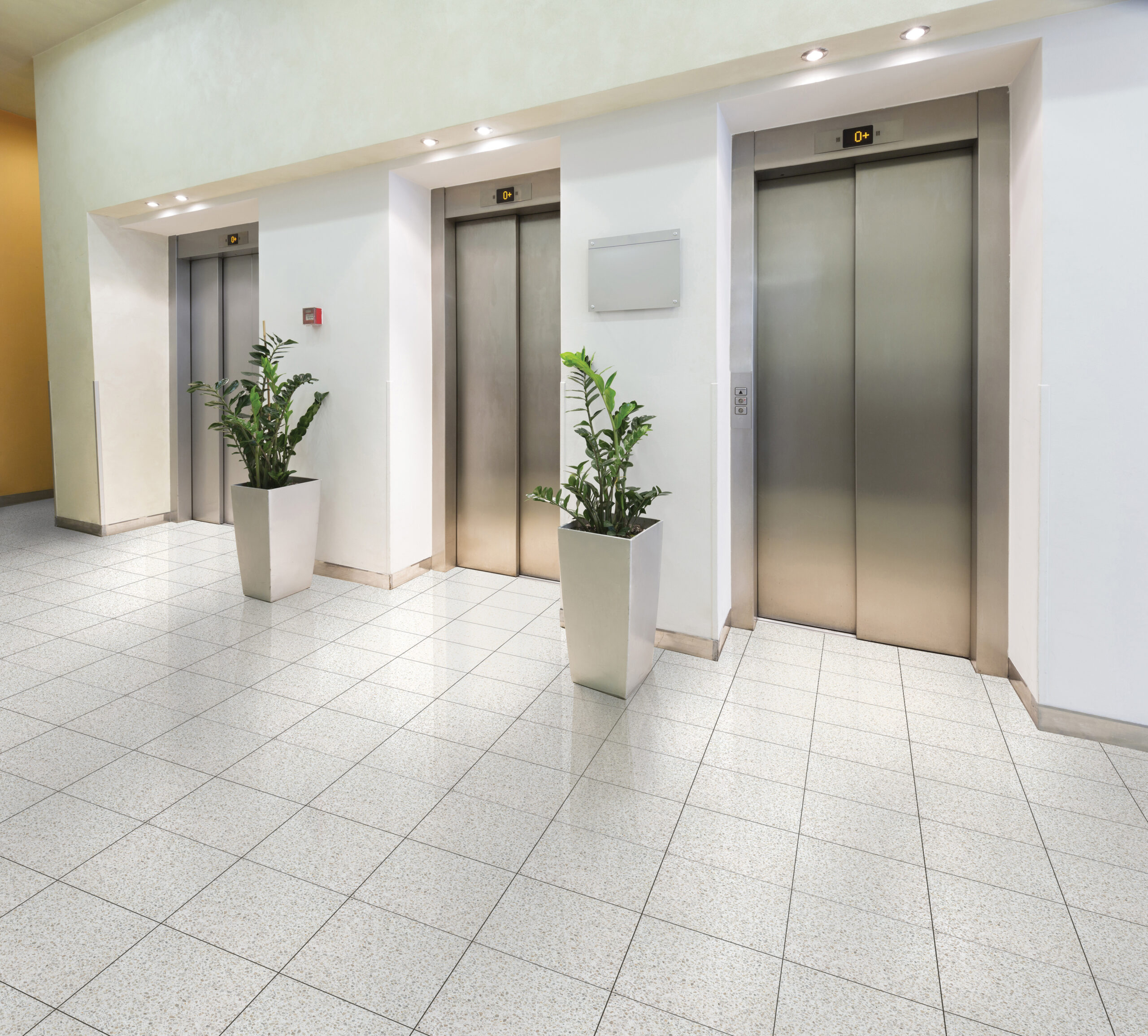 Three elevators in hotel lobby
